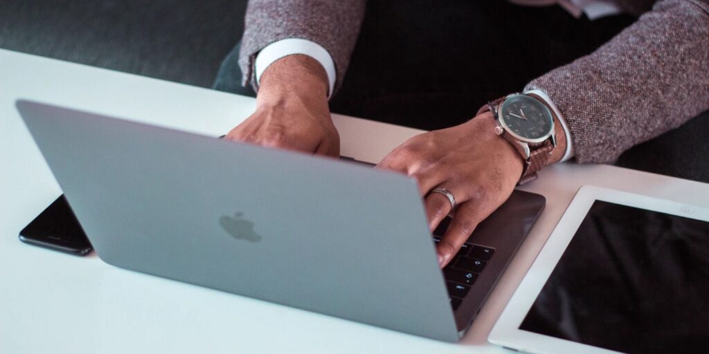 person using laptop