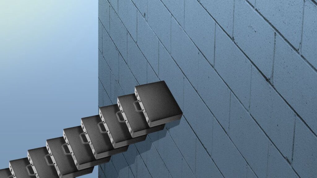 suitcase stairs to a wall